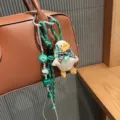 Cute cartoon duck plush bag pendant detail, green braided rope and bead hanging accessory. - Green Duckling
