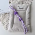 Handmade woven bag charm car hanging ornament with purple cord and letter beads for trendy style. - Light Purple