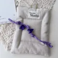 Beige fabric pouch with purple braided rope and letter charms, trendy handmade bag pendant. - Dark Purple