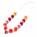 Detailed view of colorful children beaded necklace with red heart alloy pendant and adjustable cord. - Red
