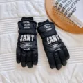 Close-up view of black fleece winter gloves detail, touchscreen compatible and non-slip. - One Size / Black