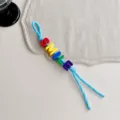 Bunter Perlen Taschenanhänger mit Buchstaben und blauem Kordel für modische Accessoires. - Buntes Blaues Seil SMILE