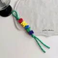 Buntes Buchstabenperlen geflochtenes Lanyard Schlüsselanhänger, stilvolles Taschenaccessoire. - Buntes Grünes Seil SMILE