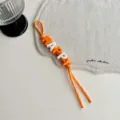 Colorful HAPPY letter beaded lanyard bag charm dopamine woven keychain accessory - Orange HAPPY