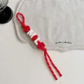 Red braided bag charm featuring white letter beads, cute stylish daily keychain accessory. - Red SMILE