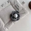 Chic black fabric camellia flower brooch with a large pearl accent, elegant fashion jewelry. - Three-Petal Gray Plaid Brooch