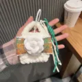 Handcrafted white crochet mini earphone pouch bag charm with camellia flower and lanyard. - Green Yellow Floral