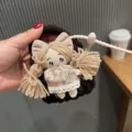 Handmade crochet bluetooth earphone storage bag cute princess doll plush bag charm pendant. - Brown Wrapped Cloth Doll + Soft Rubber Rope
