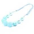 Close-up details of children chunky bead necklace featuring sparkling rhinestone balls and pearls. - Light Blue
