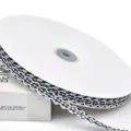 Cinta de zigzag a cuadros blanco y negro de 1 cm de poliéster para manualidades y envoltorios. - Negro
