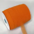 Orange lace trim roll, perfect for DIY crafts, gift packaging, and wedding decoration. - Orange