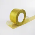 Rotolo di nastro glitterato dorato per confezioni regalo e decorazioni festive. - Larghezza Ampia / Oro