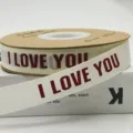 Ribbon spool variant, beige fabric with red I LOVE YOU letter print for gift packaging. - Red I Love Style