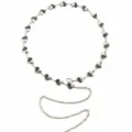 Dettaglio catena da cintura in metallo argentato con maglie a cuore, elegante gioiello donna. - Catena a Vita Cuore / Argento