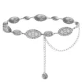 Close-up detail of vintage silver metal waist chain, boho engraved coin links and drop pendant. - Silver Lace Oval Waist Chain