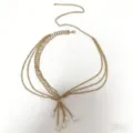 Close-up detail of the multi-layer gold alloy waist chain with elegant pearl pendants for dresses. - Gold Multi-layer Artificial Pearl Pendant Waist Chain