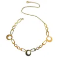 Close-up detail of the elegant gold metal link waist chain, featuring geometric hollow rings. - Loop Waist Chain / Gold