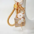 Cute metal rhinestone 3D daisy handbag keychain with pearls and braided strap pendant. - Daisy Handbag White + Heart Lanyard