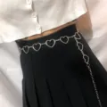 Retro metal heart chain belt for women, adjustable fashion waist accessory for everyday wear. - Hollow Heart Waist Chain / Silver