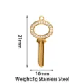 Stainless steel gold key pendant with full zircon stones, size 21x10mm, ideal for DIY jewelry. - Hollow Oval Key / Gold