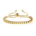 Elegante bracciale tennis in acciaio dorato con zirconi gialli e pratica catena di regolazione. - Colore Oro Pietra Gialla