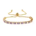 Bracciale tennis dorato regolabile con pietre di zircone scintillanti viola e bianche. - Colore Oro Pietra Viola e Bianca