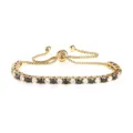 Bracciale tennis in acciaio inossidabile dorato con zirconi neri e trasparenti alternati. - Colore Oro Pietra Nera e Bianca