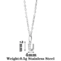 Minimalist stainless steel U letter pendant necklace with sparkling cubic zirconia stones. - Letter U / Steel