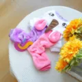 Detailed view of the cute unicorn plush four-leg pet costume, cozy and warm for small dogs. - XS / Rainbow Unicorn Costume