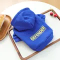 Blue pet hoodie detail showcasing the cozy fabric and stylish yellow Defender letter print on back. - XS / Sapphire Blue