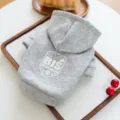 Detailed view of grey pet puppy cat hooded sweatshirt showing chest logo print and texture. - White BIS + Heather Gray
