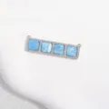 Close-up detail of rectangular silver copper cubic zirconia 4-square connector charm DIY jewelry. - Sky Blue Square Grid Pendant / White Gold