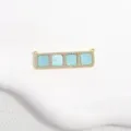 Close-up of rectangular copper pendant with cubic zirconia and blue square inlays for DIY jewelry. - Lake Blue Square Grid Pendant / Gold