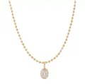 Golden beaded chain necklace featuring a bezel-set oval zircon pendant for elegant daily wear. - Vertical Oval Pendant Bead Chain (X1399) / Gold