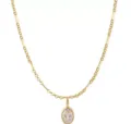 Detailed close-up view of the gleaming gold chain and sparkling oval zirconia stone pendant. - Vertical Oval Pendant Paperclip Chain (X1399) / Gold