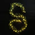Christmas Norfolk pine garland with warm LED lights, artificial green vine for holiday. - With Lights
