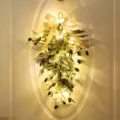 Artificial olive branch teardrop wreath with warm LED lights and burlap bow for home wall decor. - Olive Branch Plastic Vine Upside-Down Tree - With Lights