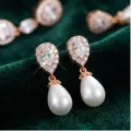 Elegante druppelparel oorknopjes met fonkelende zirkonia, perfect voor bruiloften en feestjes. - Roségoud