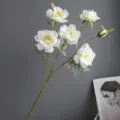 Artificial white wild rose flower branch detail, realistic fabric floral decor for home interior. - White