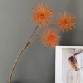Detalle de rama de flor de diente de león artificial, ideal para decoración de interiores y diseño. - H62CM / Naranja