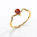 Detailed shot of gold stainless steel ring with wave band and pear red zircon stone. - Size 7 / Gold Style 4