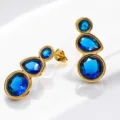 Exquisite gold-plated blue crystal earrings, detailed teardrop and round stone design closeup. - Gold Style 3