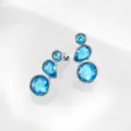 Detailed close-up of multi-stone blue crystal drop earrings with fine silver setting. - Silver Style 4