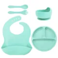 Silicone baby feeding set with suction plate, bowl, bib, spoon, and fork in mint green. - Silicone Fork And Spoon 5-Piece Set / Light Green