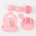 Silicone baby feeding set with bib, suction plate, bowl, cup, and spoon for toddlers. - Light Pink 10-Piece Round Plate Set