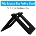 Children balance bike parking rack plastic stand holder for 10-12 inch toddler push bikes - One Size / Black