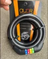 Four digit combination bicycle lock with steel cable, secure security lock for outdoor cycling. - 11mm Thick x 1100mm Long / Black