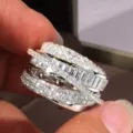 Stunning multi-layer crossover ring with sparkling pavé and baguette stones for women. - Size 5 / White Gold