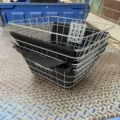 Durable metal wire bicycle front basket with black liner pad and mounting bracket for e-bikes. - Bicycle Basket / Silver
