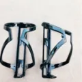 Black plastic bicycle water bottle cage mount for road and mountain bike cycling gear. - One Size / Black